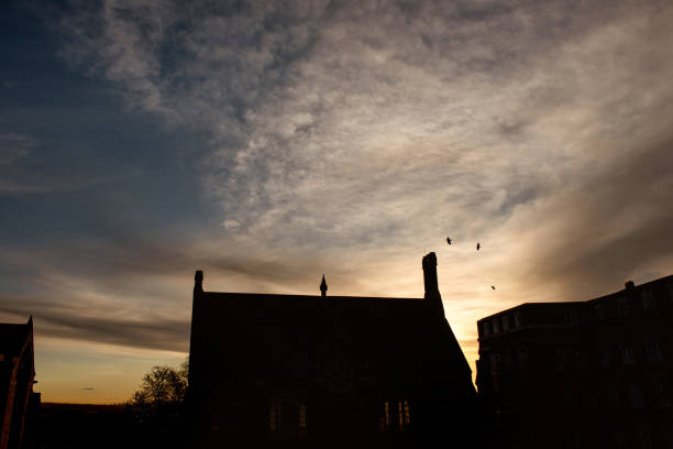 Silhouettes of Harrow School Chapel and Vaughan Library, Harrow on the Hill, England
