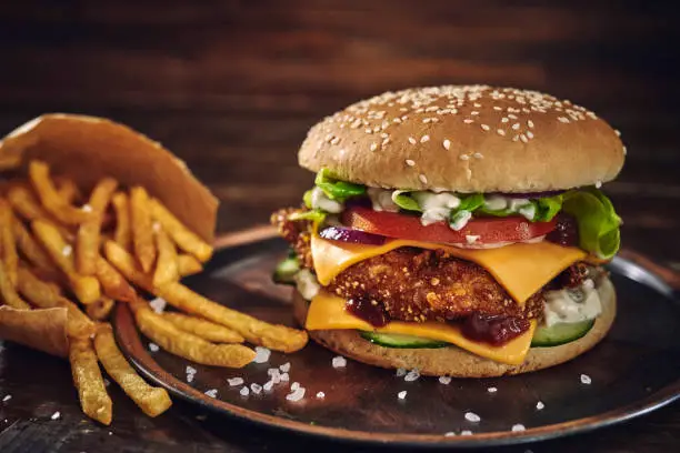 Crispy Chicken Burger with Cheese, Tomato, Onions and Lettuce