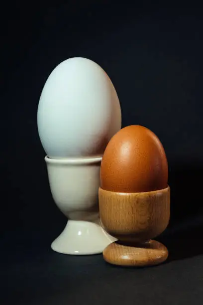 Photo of Chinese goos egg and ordinary hen's egg.