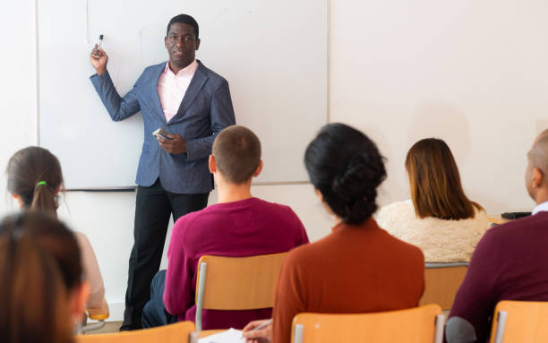 istock University teacher conducts lesson for students 1305339497