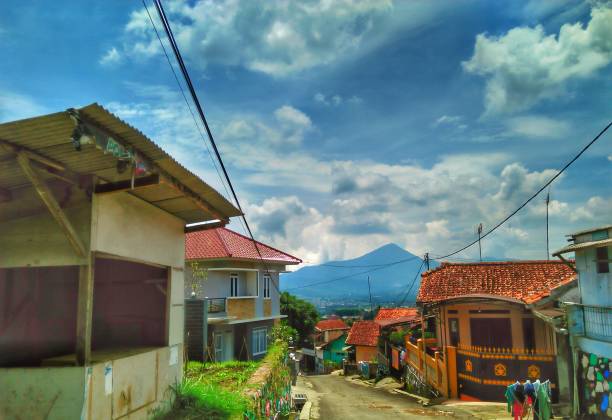 istock Country Road with high mountain views 1305340783
