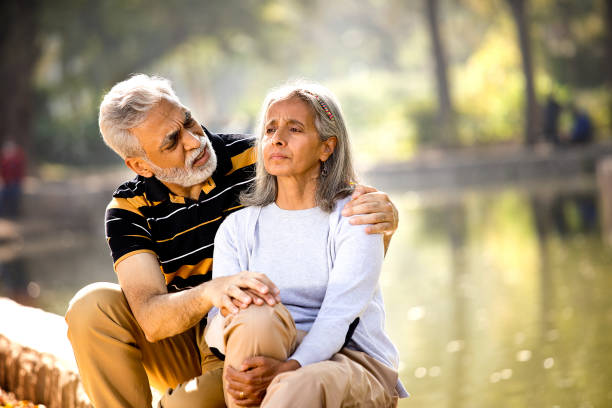 istock Senior man consoling his angry wife 1305341498
