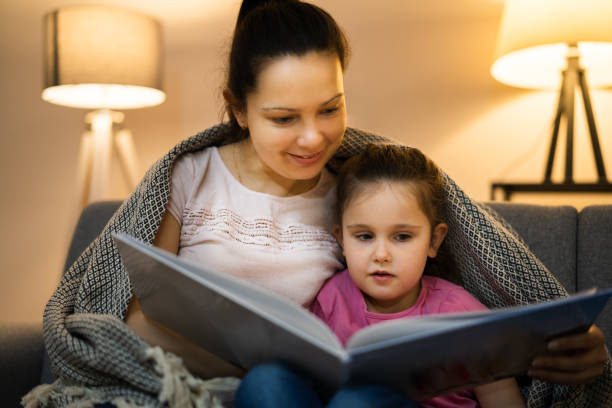 istock Bedtime Family Story In Evening 1305342743