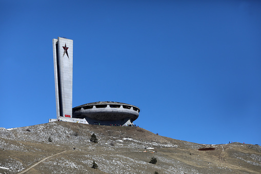 Buzludzha, Bulgaria, March 3, 2021: The Buzludzha abandoned monument in the Stara Planina mountains, Bulgaria. Monument is one of the most iconic building left after the communist party in Bulgaria.