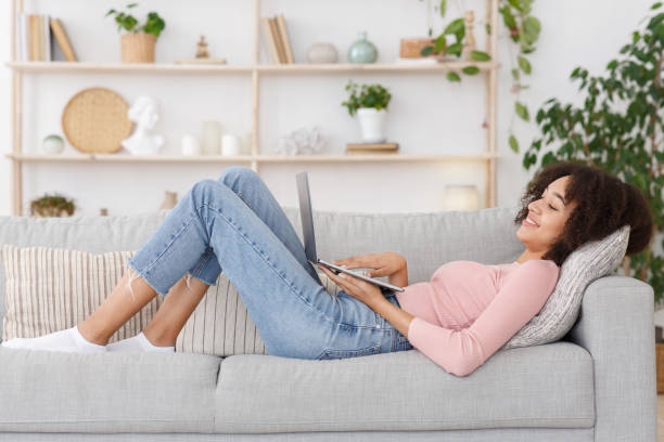 istock Relax with gadget, watching videos and chatting in social networks 1305344497