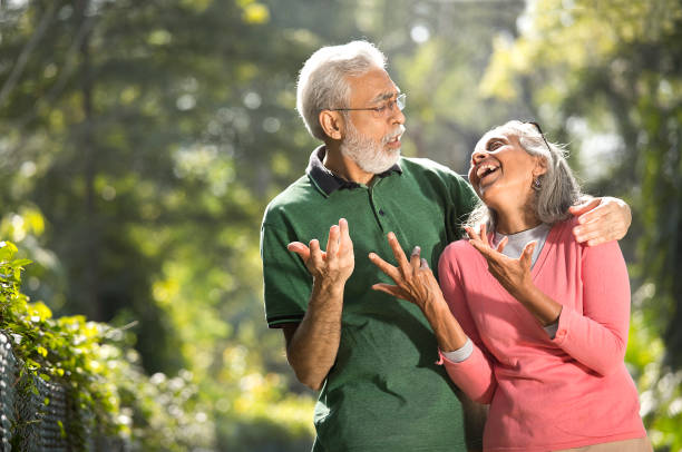 istock Joyful senior couple at park 1305344524