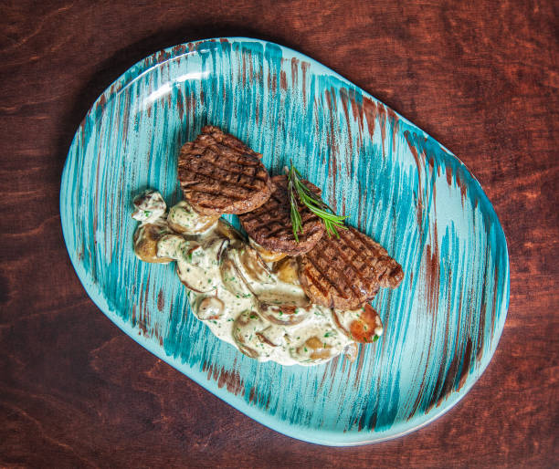 istock Grilled meat steak with cream sauce 1305344868