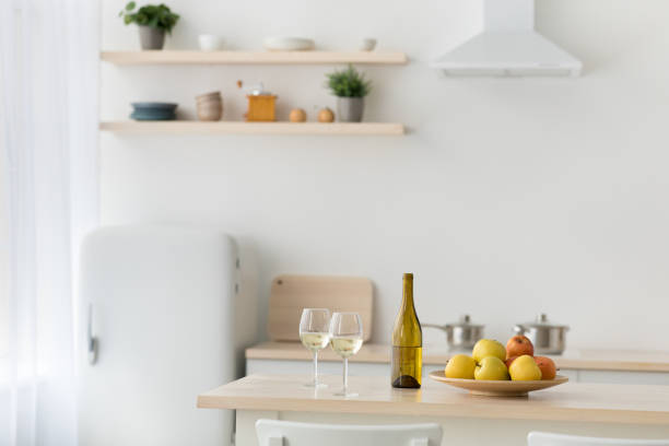 istock Wine and snack, contemporary simple kitchen interior, scandinavian design 1305350925