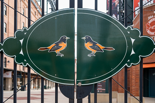 Baltimore, USA - February 26, 2021 -Entrance to Camden Yards, the Baltimore home of the American League Baltimore Orioles, Oriole Park at Camden Yards, often referred to as just Oriole Park or Camden Yards, is a Major League Baseball ballpark located in Baltimore, Maryland. Home to the Baltimore Orioles, it is the first of the \