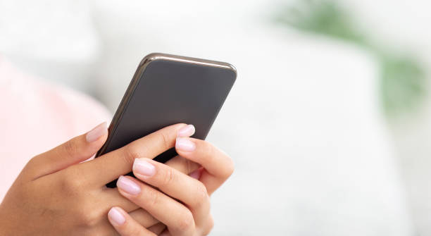 istock Use mobile smartphone, technology, online shopping, mobile apps, texting, addiction, swipe up 1305354260