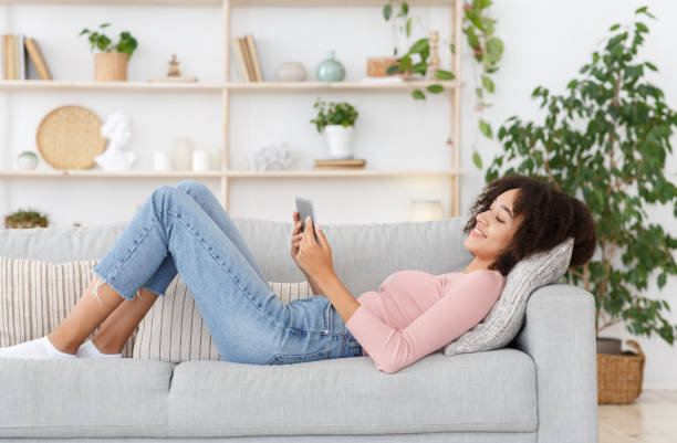 istock Relaxation with gadget at home on weekends or free time and surfing in internet 1305356548