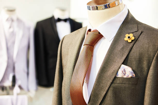 istock Men's suits with shirts and ties in store 1305360896