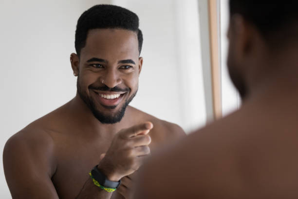 istock Happy young handsome african ethnic man tuning into positive day. 1305364258