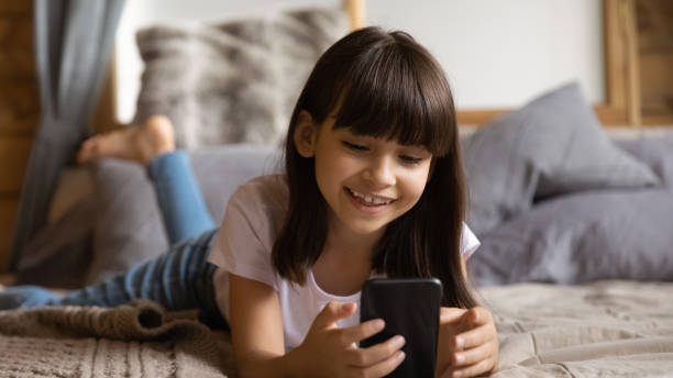 istock Happy Latino girl use cellphone gadget for communication 1305366466