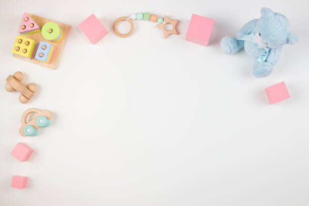 istock Baby kids toys frame on white background. Top view. Flat lay. Copy space for text 1305369365