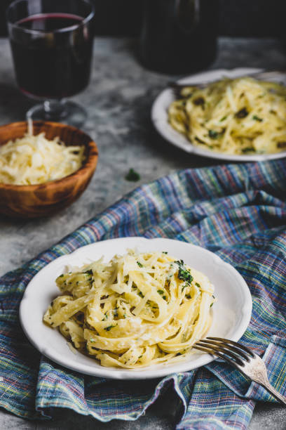 istock Portions of Pasta Alfredo 1305374508