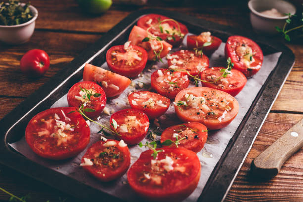 istock Preparation of Tomato Preserves with Thyme and Garlic 1305375066