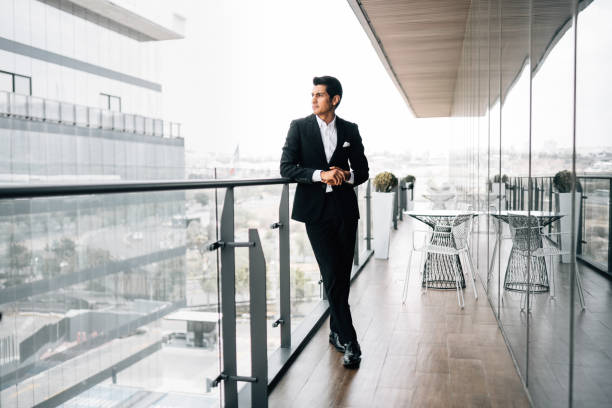 istock Businessman portrait in modern office 1305378383