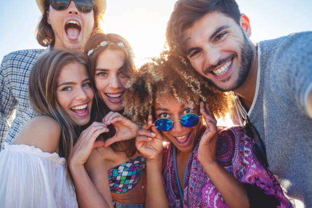 istock Group of friends having fun taking a selfie. 1305379826