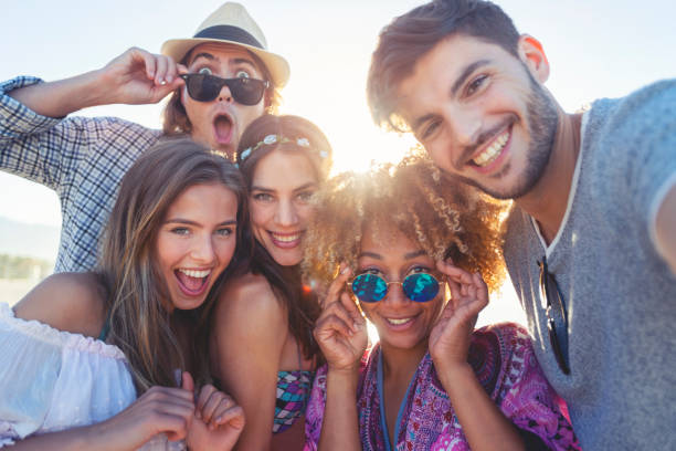 istock Group of friends having fun taking a selfie. 1305379827