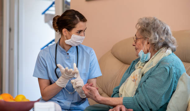 istock Doctor advises her patient. COVID-19 concept. 1305380687