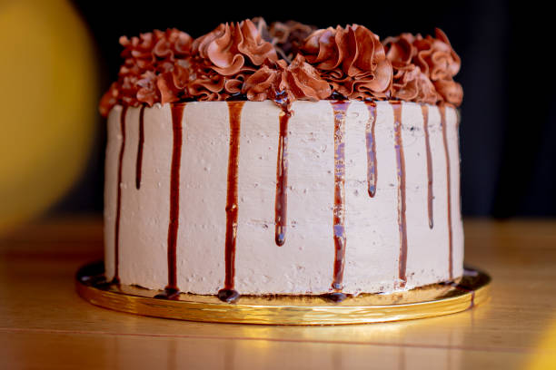 istock Delicious chocolate cake decorated with chocolate whipped cream on top. 1305384283