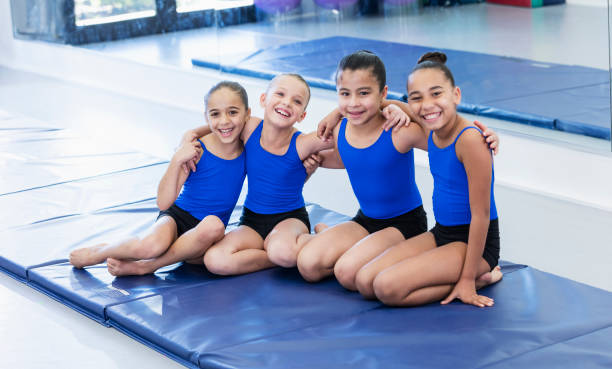 istock Four girls in gymnastics class 1305386222