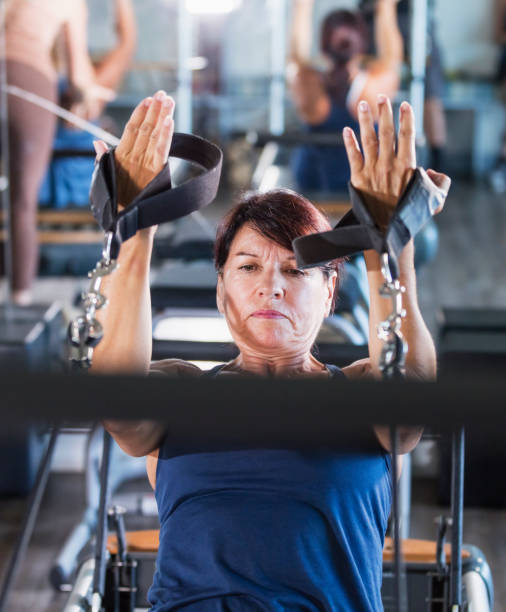 istock Senior women working out in Pilates studio 1305387517