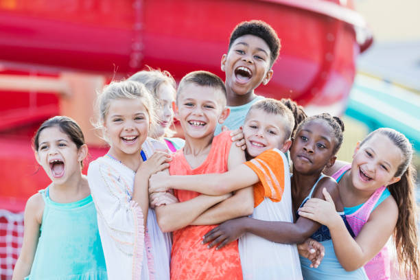 istock Group of friends having fun at water park 1305387774