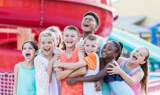 istock Group of friends having fun at water park 1305388411