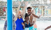 Group of children playing at a water park