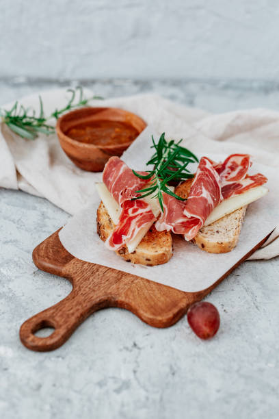 Spanish ham with toasts,rosemay,garlic and olive oil
