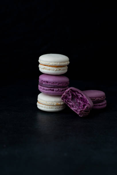 istock Macaroons stacked close-up on dark background 1305397147
