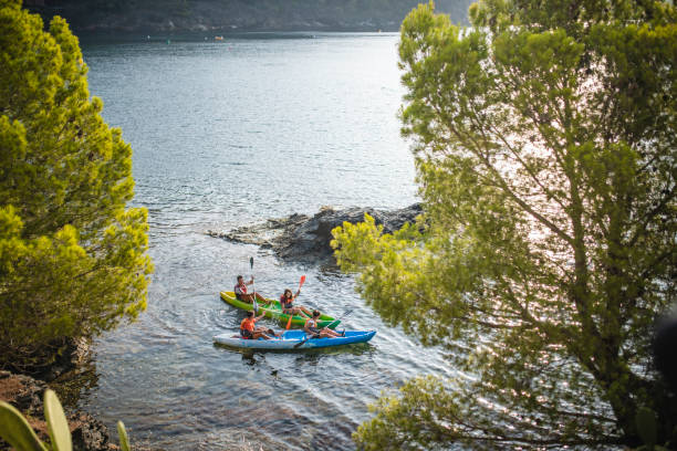 istock Spanish Kayakers Side by Side Along Mediterranean Shoreline 1305403237