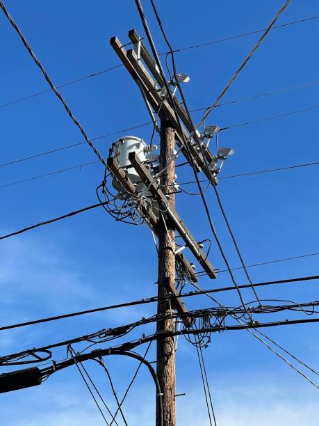 istock Power pole and utility lines - Color Portrait Format 1305412710