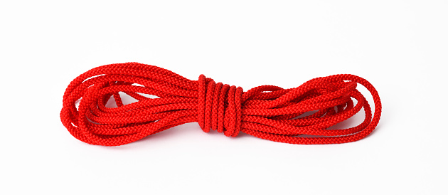 Bunch of red rope isolated on white with clipping path.