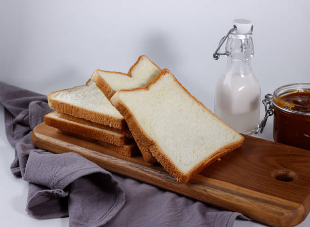 istock Sliced Toast Loaf White Bread (Shokupan or Roti Tawar) for Breakfast on White Background, 1305419113