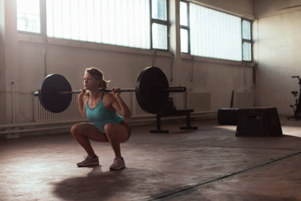 istock Squatting is the exercise of the day 1305421103