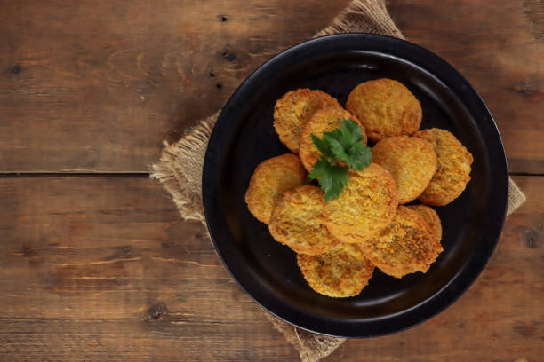 istock chicken nuggets with sauces on plate on wooden table 1305421352