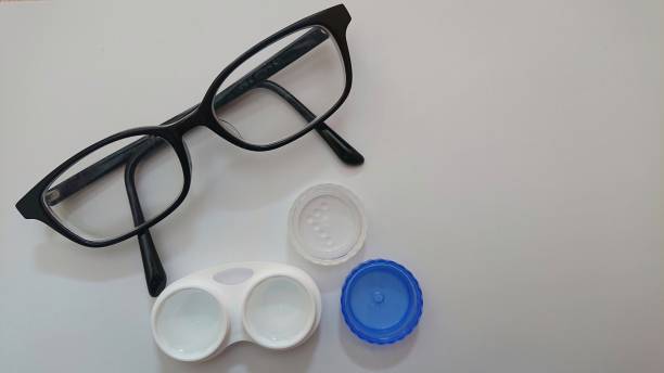 istock contact lenses and glasses (right space) 1305425385