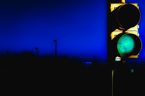 Two light traffic signal at twilight.
