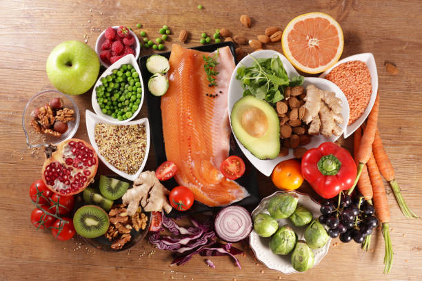 istock health food- fruit, vegetable, cereals and fish 1305426203