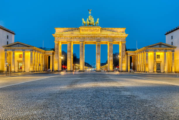 istock The famous illuminated Brandenburg Gate 1305428740