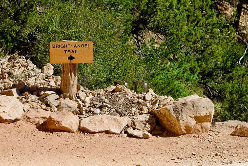 Directional sign along the upper section of the Bright Angel Trail near the South Rim of the Grand Canyon on a hot, summer day.