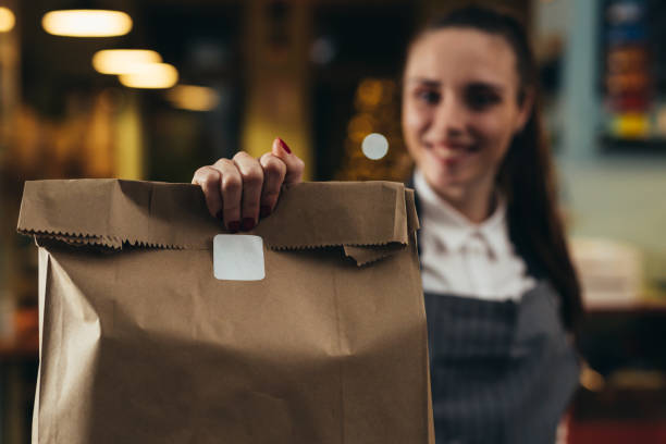 istock waitress working in cafe or restaurant 1305433524