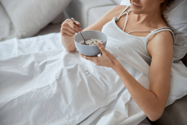 istock Focused photo on young woman having bed rest 1305434653