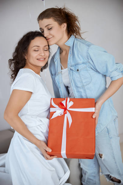 istock Positive delighted lesbians enjoying their own fest 1305434657