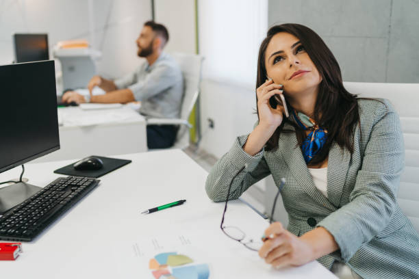 istock Business people working in modern office s 1305434858