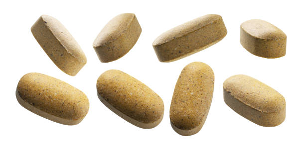 istock A set of yellow tablets. Isolated on a white background 1305435653