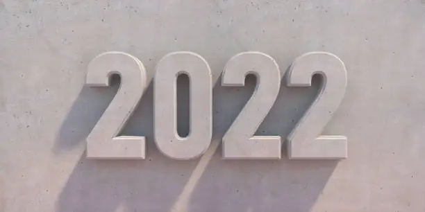 Photo of 2022 New Year. Number concrete material and industrial cement background. 3d illustration